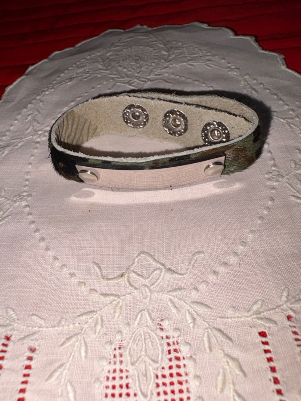 Plunder ID camo color bracelet, adj. 3 snaps to close, length 8 1/2”  $10